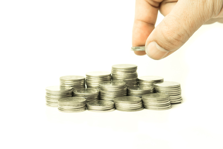 stack of coins isolated on white backgroundの写真素材