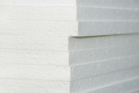 white styrofoam tables pile corner, construction materialsの写真素材
