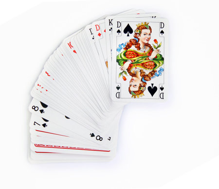 the queen of spades on card pack over white