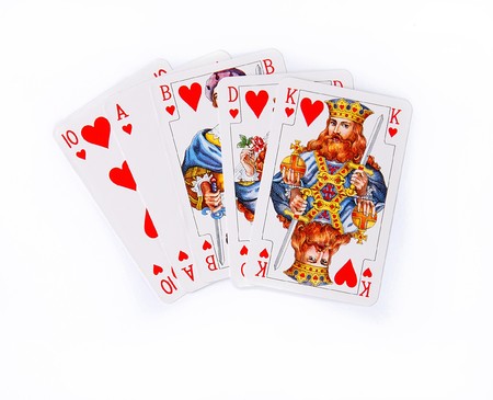 white playing cards hearts winning combination isolatedのeditorial素材