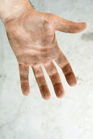 man dirty hand closeup isolated on gray backgroundの写真素材