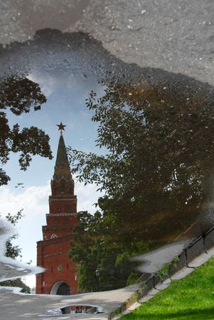 The Kremlin Borovitskaya tower, Moscow, Russia, mirrored in poolの写真素材
