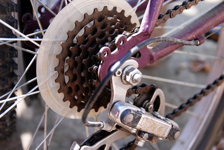 rusty bicycle gears for speed regulation closeup outdoorの写真素材