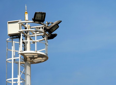 airport light tower over blue sky in Belgrade airportの写真素材