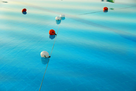 blue water surface in swimming pool in resortの写真素材