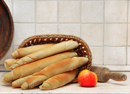 Appetizing home made bread rolled loafs in kitchen
