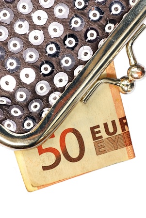 details of silver purse with fifty euros banknote over white backgroundの写真素材