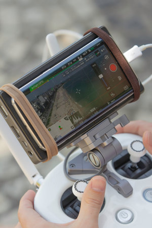Man holding drone remote control radio