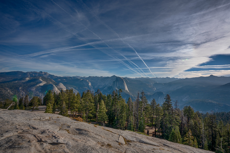 Panoramic view of Yosemite National Park with Half Dome in the center, Californiaの写真素材