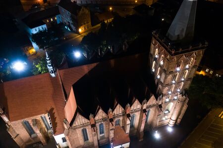 Drone, night view of a Gothic Cathedral in Europeの写真素材