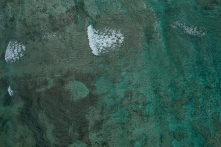 Aerial view of an ocean surface with waves in Caribbean