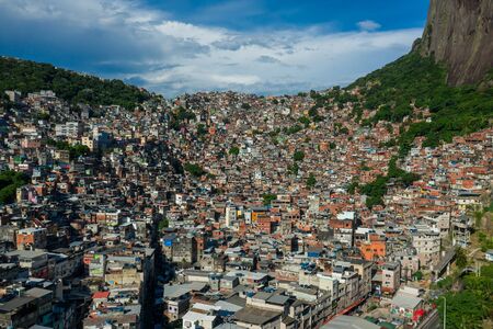 Amazing, aerial view of favela Rocinha at the foot of Dois Irmao mountainの写真素材
