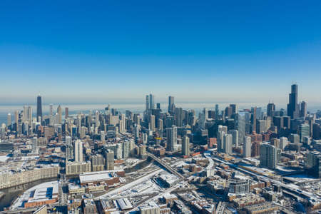 Aerial, panoramic shot of Chicago skyline with baby blue, winter skyのeditorial素材