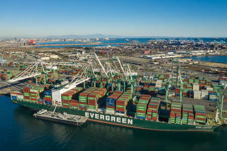 Huge intermodal cargo ship at Long Beach Port in California USAのeditorial素材