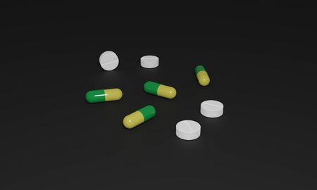3D rendering of yellow and green two piece capsules and white tablets or pills lying on the surface of a black background. Great for medical, pharmaceutical or medication banner, backdrop or poster.の写真素材