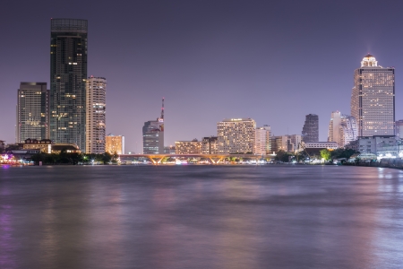 Bangkok view on both sides of the River, including leading five-star hotels, with Sathorn Bridge (Taksin Bridge) in the middle.のeditorial素材