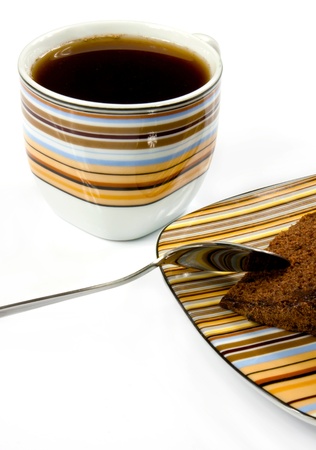 Cup of coffee, gingerbread and little spoonの写真素材