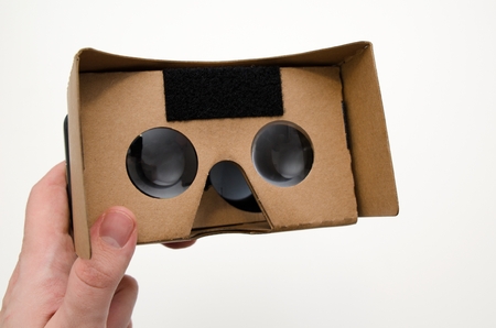 Virtual reality cardboard glasses. Easy way to watch movies and play games in 3Dの写真素材