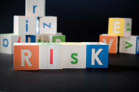 RISK word with colorful blocks. risk business leadership process finance cube blocks conceptの写真素材