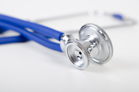 Blue stethoscope close up. stethoscope isolated white background health check blue equipment conceptの写真素材