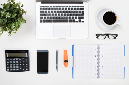 Business white desk in office top view. office supply order arrangement background banner blank business conceptの写真素材