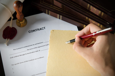 Notary signing a contract with fountain pen. business man law attorney lawyer notary public