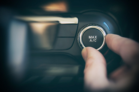 Air conditioning button inside a car. Cold, heat control conceptの写真素材