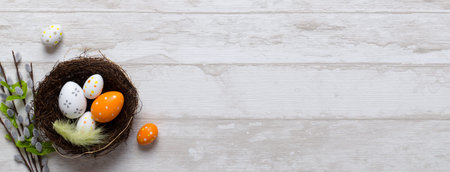 Happy easter decoration background, eggs in the nest, springtime rural composition top view concept