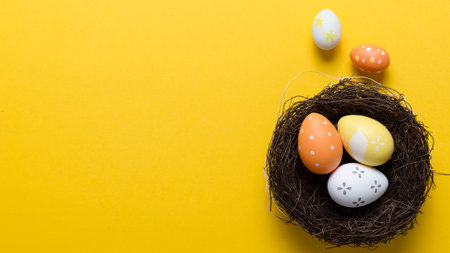 Happy easter decoration background, eggs in the nest, springtime rural composition with copy space