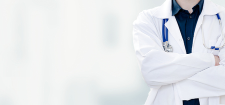 Unrecognizable doctor with stethoscope. Copy space web banner background conceptの写真素材