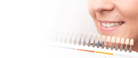 Woman smile with healthy teeth whitening. Dental care concept.の写真素材