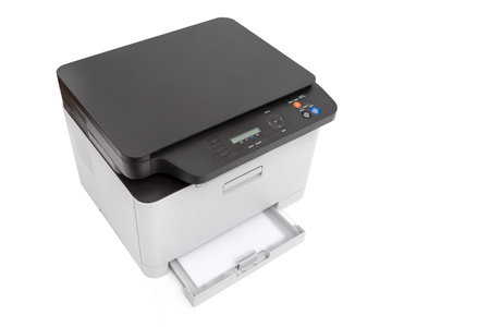 Multifunction device, copier, scanner, printer in office. Professional laser printer wide image...
