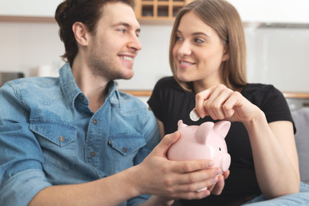 Home budget, family finance with piggy bankの写真素材