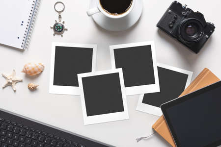 Blank photo frames. Printed photographs, photo lab concept, top viewの写真素材
