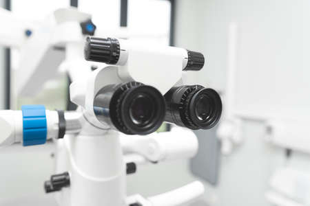 Dental endodontic binocular microscope. Closeup of a dentist microscope for a teethの写真素材