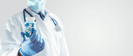 Medical research, drug search, chemical formula concept. Doctor holding bottle of pills.の写真素材