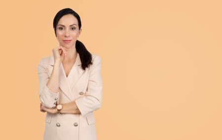 Businesswoman, professional employee, studio shot with copy space backgroundの写真素材