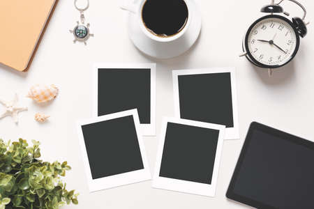 Blank photo frames. Printed photographs, photo lab concept, top viewの写真素材