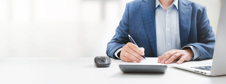 Businessman working in office. Analyst, bookkeeper concept, wide image with copy space