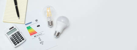 Energy rating chart with light bulbs. Energy efficiency concept. New EU energy label, 2021 classificationの写真素材