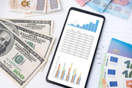 Budget, finance, business chart on smart phone screen. Investment conceptの写真素材