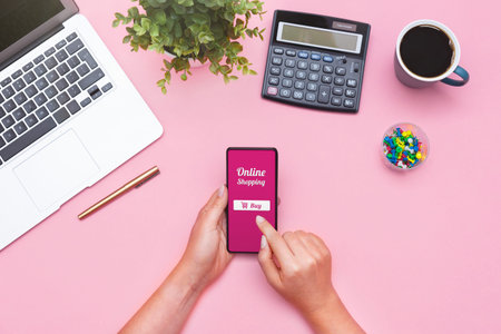 Woman using mobile app, online shopping concept, flat layの写真素材