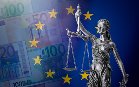Law concept with lady justice. Composition with European Union flag and Euro banknotes in the backgroundの写真素材