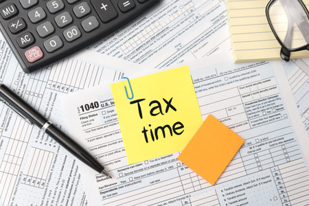 Tax time concept. US tax form, tax income, tax refund concept