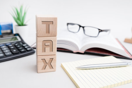 Budget, finance and tax concept with wooden blocksの写真素材