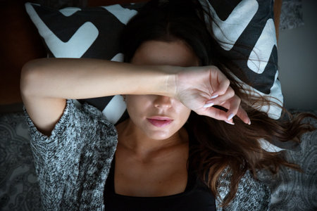 Woman suffering from depression. Sadness and headache conceptの写真素材