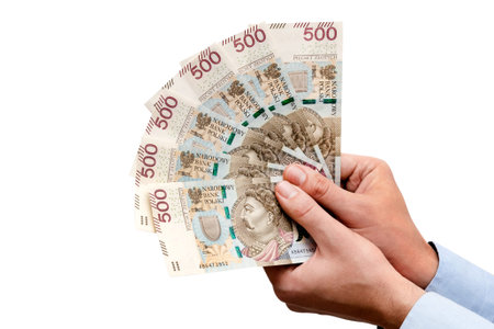 Polish 500 PLN banknotes in hand, Polish currency