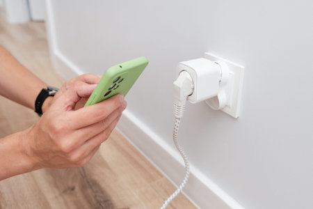 Using Wi-fi smart socket on the wall in a smart home, controlling electricity consumption