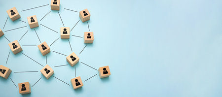 Community, teamwork and team-leader concept with wooden blocksの写真素材