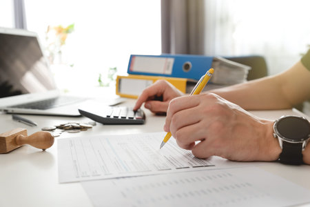 Working with documents, business person workspace in office